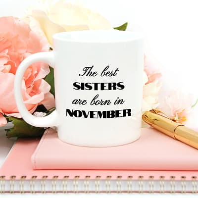 Sisters-Nov-Best Born In_Mug on Pink notebooks w-Flowers-StockStyle-Template711_SQ CROP-800